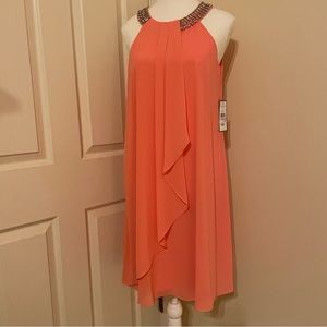 Coral chiffon knee length dress. New with tag